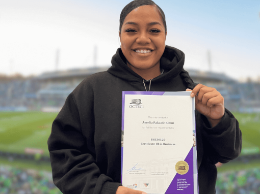a woman holding a certificate